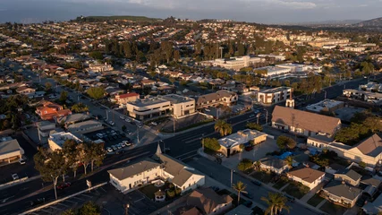 Peel and stick wall murals United States Sunset aerial view of a downtown church and surrounding city of Montebello, California, USA.