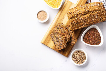 Homemade Gluten Free Bread. Healthy Eating Concept. Millet, buckwheat, psyllium husks, flax seeds...