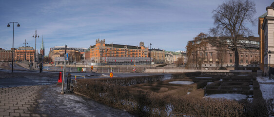 Fototapeta na wymiar The bridge Vasabron, parliament buildings, an early spring sunny day in Stockholm