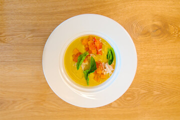 Pumpkin soup with crab meat, top view