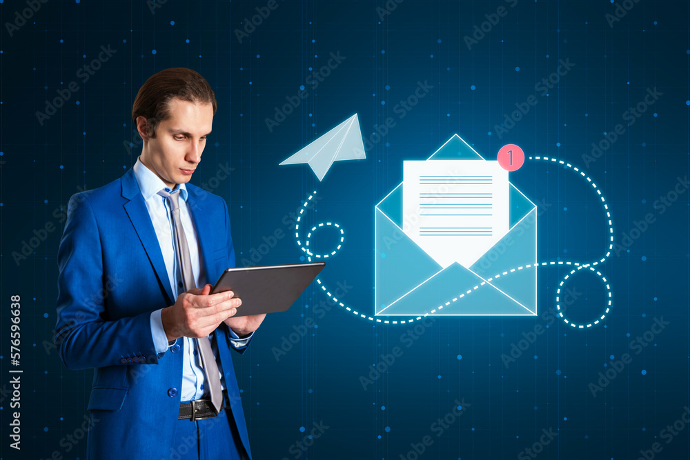 Fototapete Electronic mail, sending and receiving, direct and online message concept with businessman using digital tablet checking his mailbox on dark background with envelope icon and notification alert