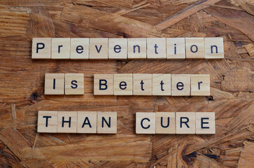 prevention is better than cure text on wooden square, health quotes