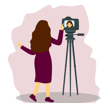 Young girl taking video of herslef on camera, making video content to vlog, concept of Social media, Broadcasting, Technology.