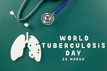 Fototapeta na wymiar World TB Day. Lungs paper cutting symbol and medical stethoscope on green background, copy space, lung cancer awareness, concept of world tuberculosis day, banner background, respiratory diseases