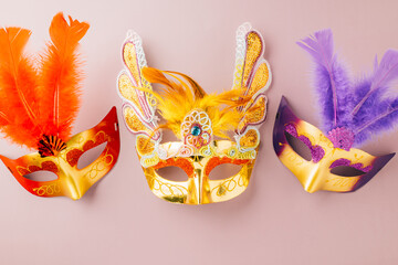 Plakat Happy Purim carnival. Carnival mask for Mardi Gras celebration isolated on purple background banner design with copy space, jewish holiday, Purim in Hebrew holiday carnival ball, Venetian mask