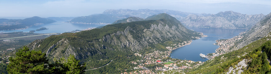 Fototapeta na wymiar Aerial panoramic view of the Bay of Kotor, Montenegro from the observation platform of Mount Lovcen. A panoramic view covering the entire fjord.