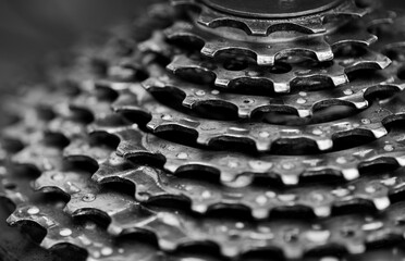 Close up of mountain bike cogs/wheel in black and white