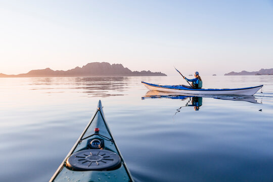 Woman sea kayaking in Bahia de Loreto National Park, Puerto Escondido, Baja California Sur, Mexico