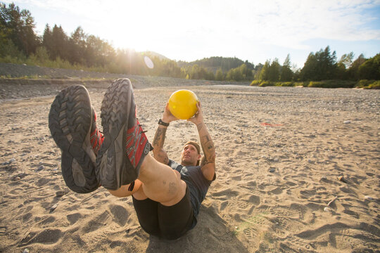 Fit Man Completes  An Outdoor Exercise Routine.