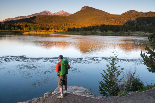 Man hiking along Lily Lake Trail, Rocky Mountain National Park, Estes Park, Colorado, USA