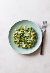 Gnocchi with pesto sauce, basil and Parmesan cheese. Healthy food. Vegetarian food. Diet.
