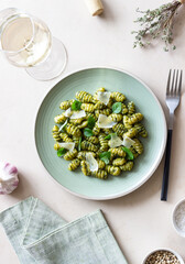 Gnocchi with pesto sauce, basil and Parmesan cheese. Healthy food. Vegetarian food. Diet.