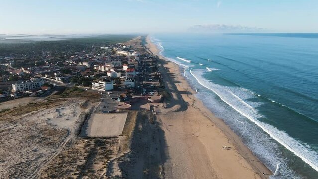 lacanau ocean nouvelle aquitaine gironde France Europe drone aerial above top view video footage 4k beach town sea waves beautiful exploring famous surf spot French 