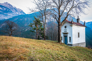 Chiusaforte and the little church of Raunis seen from above. Friuli