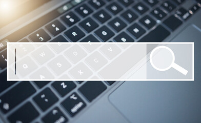 Laptop, keyboard and search bar for research, question or query on information, data or knowledge...