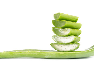 Fresh aloe vera leaves and slices isolate against white background for health and beauty products.