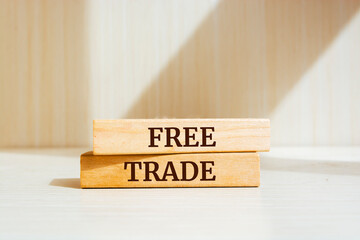 Wooden blocks with words 'Free Trade'. Business concept