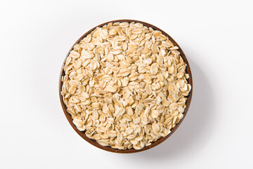 Oat flakes isolated on white background.