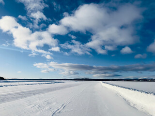Fototapeta na wymiar Winter landscape of ice road in north of Sweden