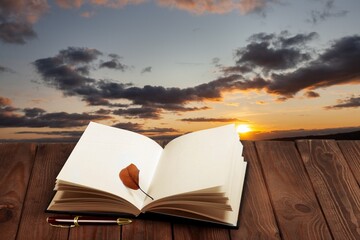Reading Book with office Pen on desk