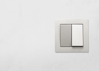 gray light switch on the wall close-up