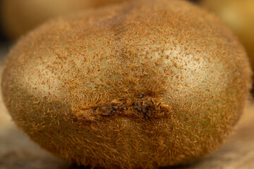 Whole ripe kiwi on the table