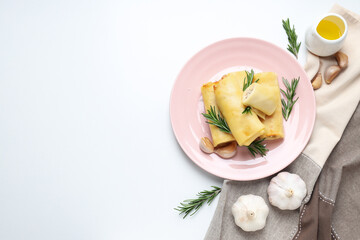 Concept of tasty food, thin pancakes with filling, space for text