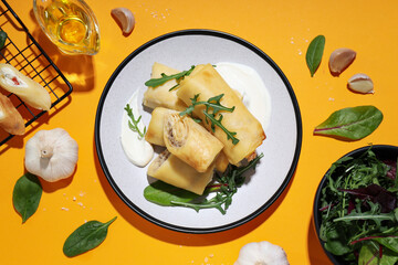 Concept of tasty food, thin pancakes with filling, top view