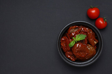 Concept of tasty food - delicious dried tomato