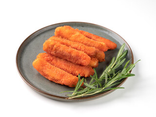 Fish fillet sticks fried on a green plate with rosemary on a white isolated background.