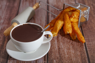 cup of hot chocolate with churros