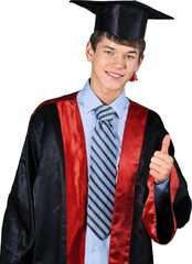 Teen male graduate giving thumbs up