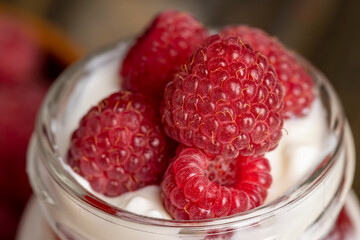 Fresh milk yogurt with whole fresh raspberries