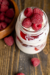 Fresh milk yogurt with whole fresh raspberries