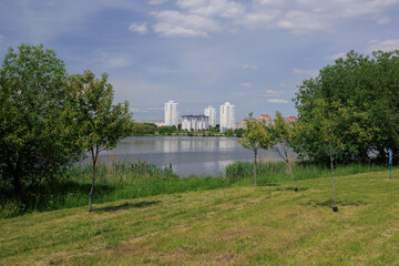Buildings and houses standing on the shore of a lake, river or sea.
