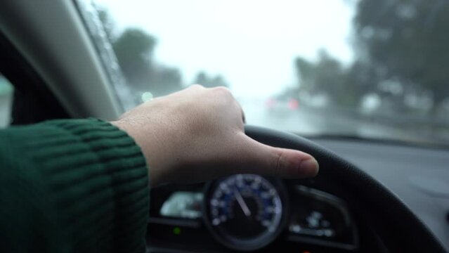 driving a car on wet rainy day