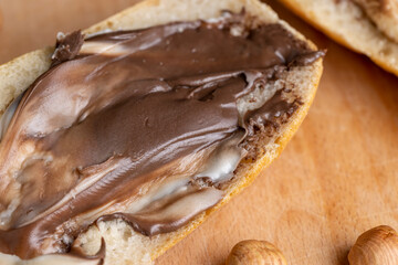 slices of bread with chocolate butter on the table