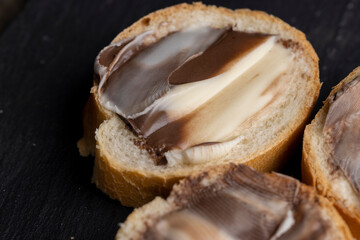 Sweet chocolate butter spread on a baguette