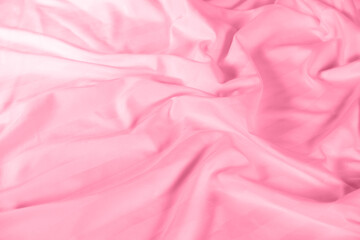 Abstract pink fabric background, satin stripe texture, wavy folds of elegant expensive fabric