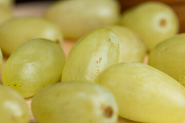 Harvested green grapes on the table