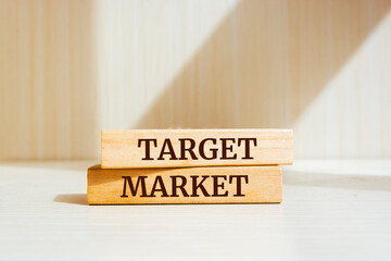 Wooden blocks with words 'Target Market'. Business concept