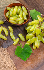 Natural organic different types of fresh ripe juicy grapes and space for text on table. top view, Agriculture concepts.
