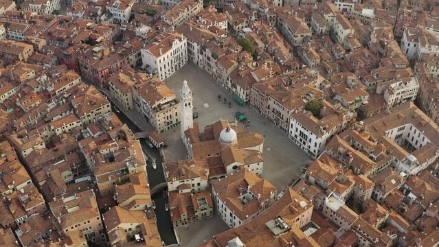 Aerial view of San Marco square in Venice old town along the lagoon in Veneto, Italy.