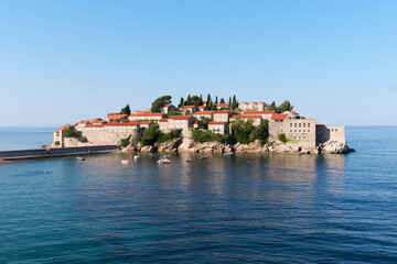 Fototapeta na wymiar Panoramic view of Sveti Stefan island in Budva in a beautiful summer day, Montenegro.