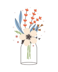 Glass jar with a bouquet of spring flowers.