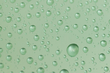 water drops on green background