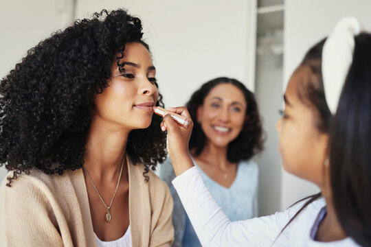 Beauty, makeup and lipstick with mother and daughter for bonding, playing and affectionate. Care, happiness and relax with black woman and child in family home for cosmetics, happy and grooming