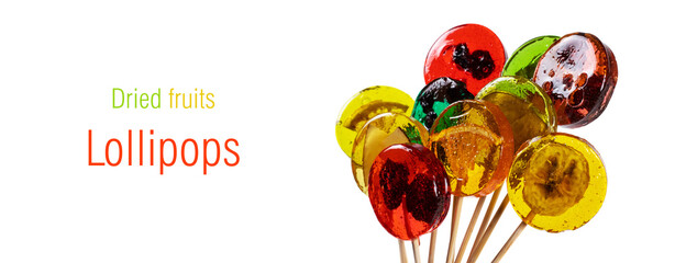 Homemade dried fruit lollipop made from natural dehydrated berries on white background.