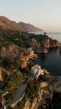 Vertical aerial view of Marina Piccola beach in Capri Island, Naples, Campania, Italy.