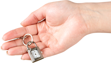 Hand Holding Keychain Lock With Clock And Key - Isolated